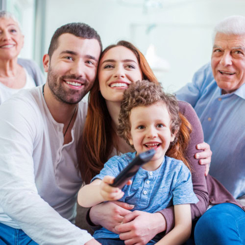 Family watching old photos together